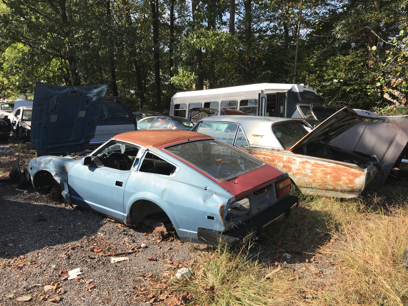 The rusting shell of a Datsun 280Z.